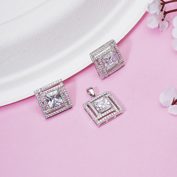 925 silver pendant set with zircon-studded earrings, adding sophisticated sparkle.