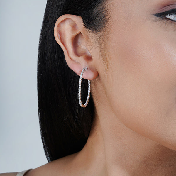 925 silver hoop earrings with sparkling zircon studs for an elegant, sophisticated look.