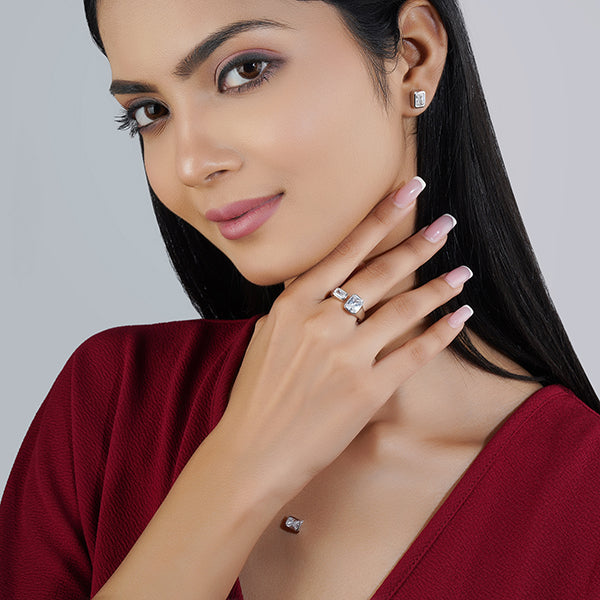 "925 silver pendant set with zircon stones, includes matching earrings and finger ring for a complete look."