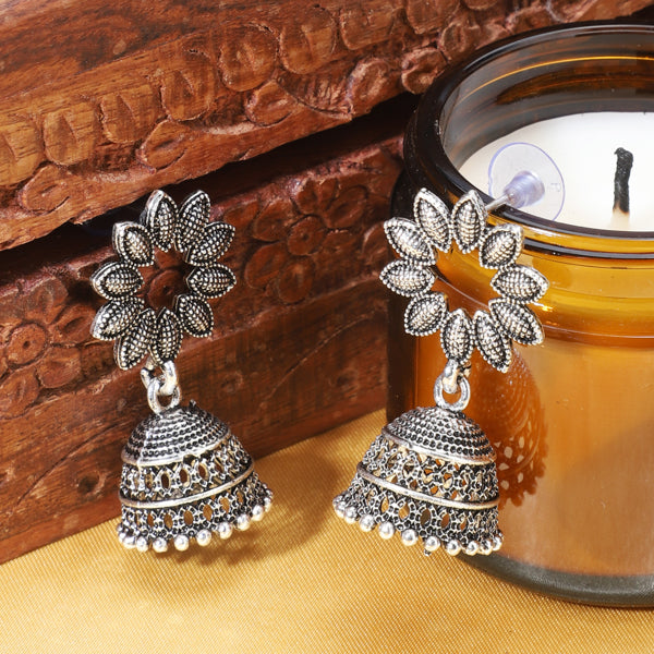 "Elegant oxidized jhumka earrings for a chic and charming festive look."