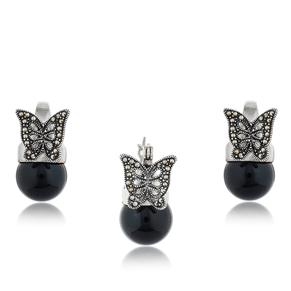 "Elegant 925 silver butterfly pendant set with pearls, perfect for a sophisticated party look."