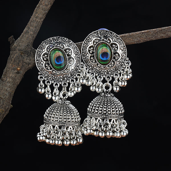 "Oxidized peacock feather jhumkas with intricate details, blending tradition and elegance."