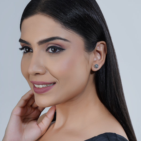 "925 sterling silver studs, timeless and versatile for elegant everyday wear."