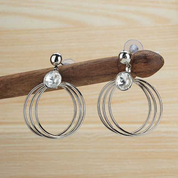 "Oxidized hoop earrings with a studded stone, blending modern style with a hint of sparkle."