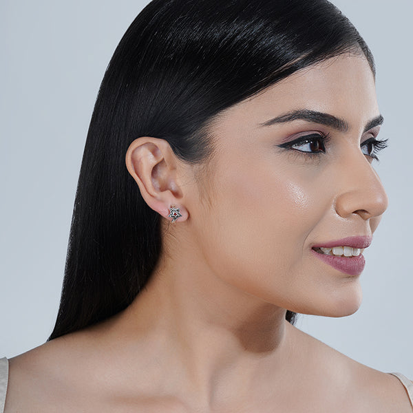 "Classic 925 sterling silver studs, timeless and versatile for everyday elegance."