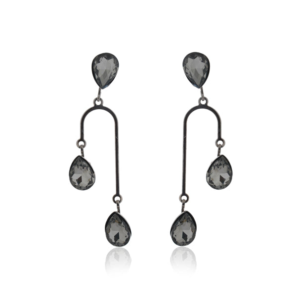 "Stylish oxidized danglers studded with black stones, offering a bold and sophisticated look."