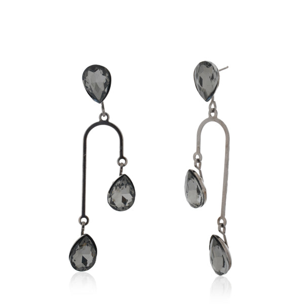 "Stylish oxidized danglers studded with black stones, offering a bold and sophisticated look."