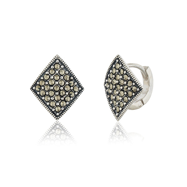 "Classic 925 sterling silver studs, offering timeless elegance and everyday versatility."