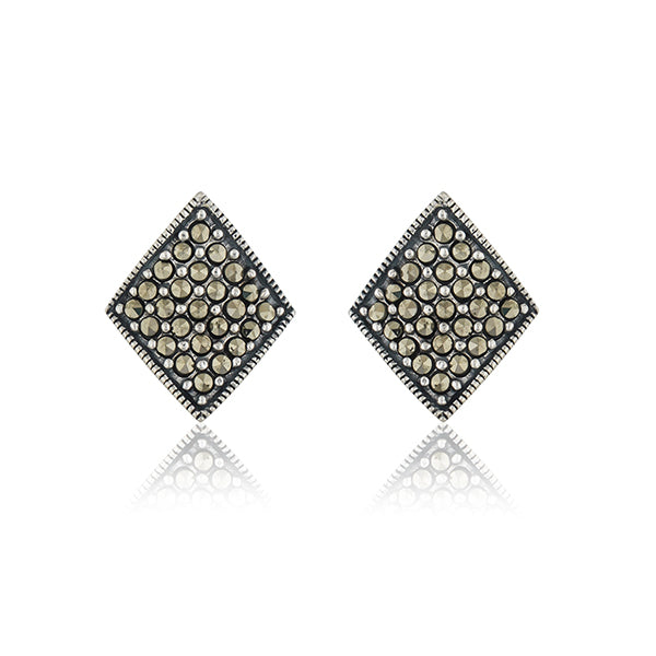 "Classic 925 sterling silver studs, offering timeless elegance and everyday versatility."