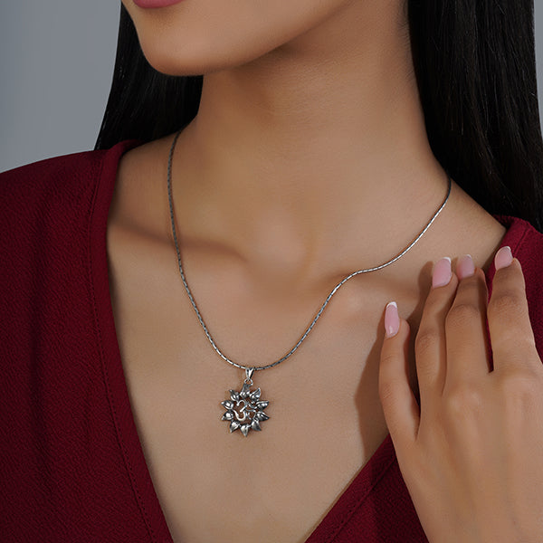 "Intricately crafted 925 silver pendant with an Om design, symbolizing peace and spirituality."