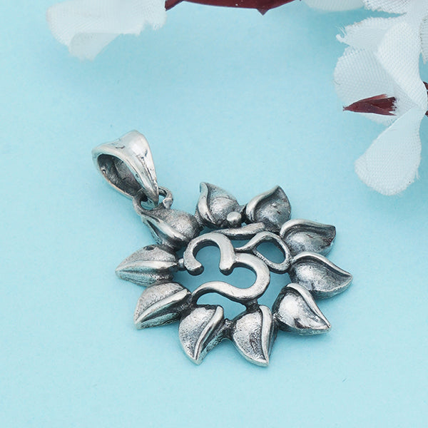 "Intricately crafted 925 silver pendant with an Om design, symbolizing peace and spirituality."