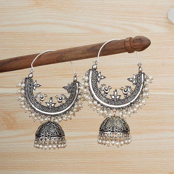 Beautiful oxidized jhumka earrings with intricate detailing for a traditional festive look.