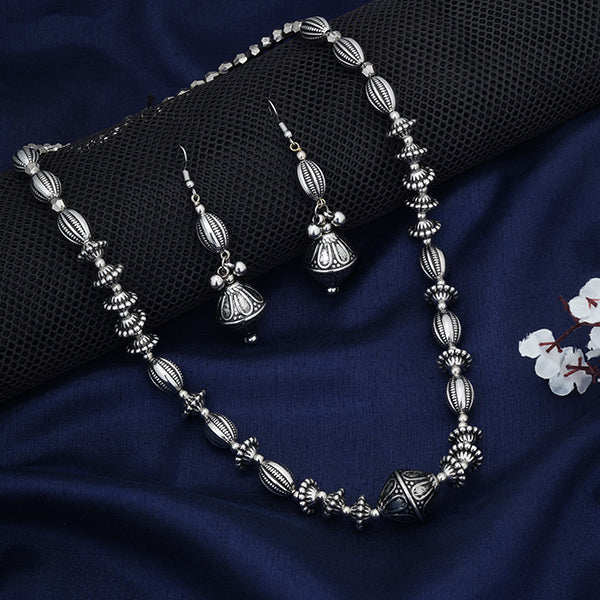 Elegant oxidized short necklace set with fine detailing, adding a timeless vintage touch to festive outfits.