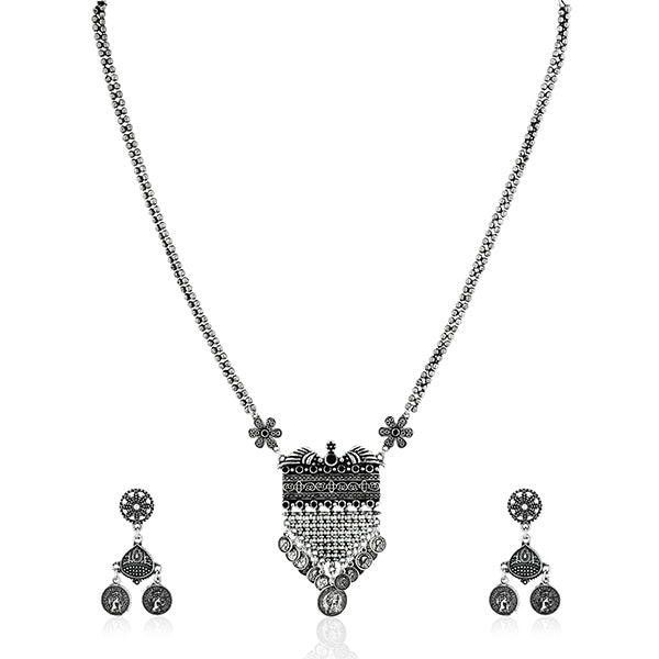 Long oxidized necklace set with intricate designs, blending traditional artistry with vintage charm.