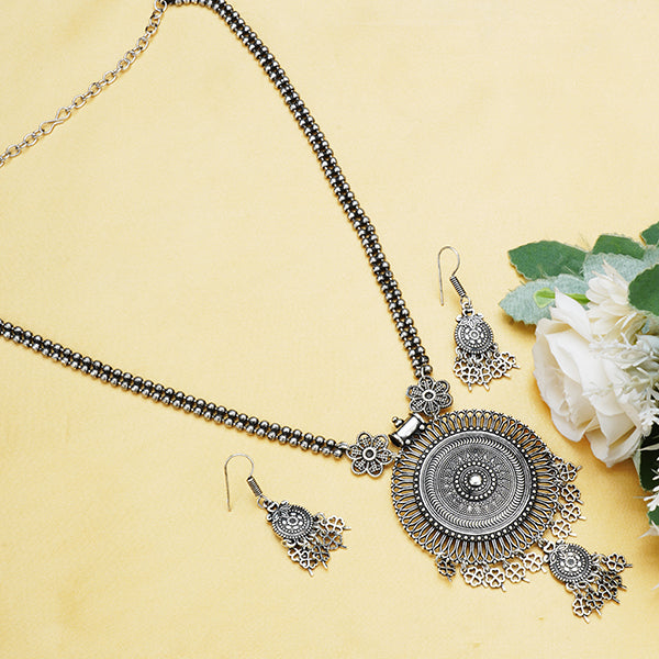 Stunning oxidized long necklace set with detailed design, perfect for a festive, elegant look.