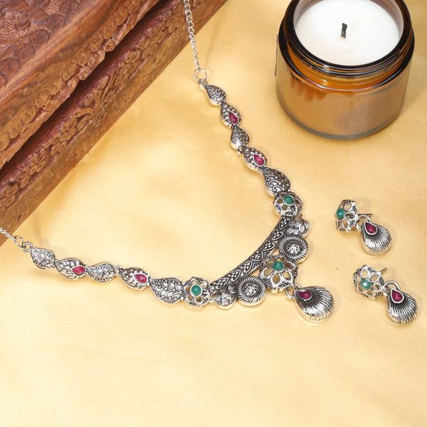 Elegant oxidized choker set with matching earrings and bracelet, ideal for a stylish festive look.