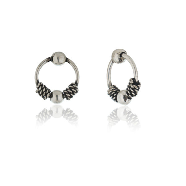 Delicate 925 silver hoop earrings with small ring design for a subtle, stylish touch.