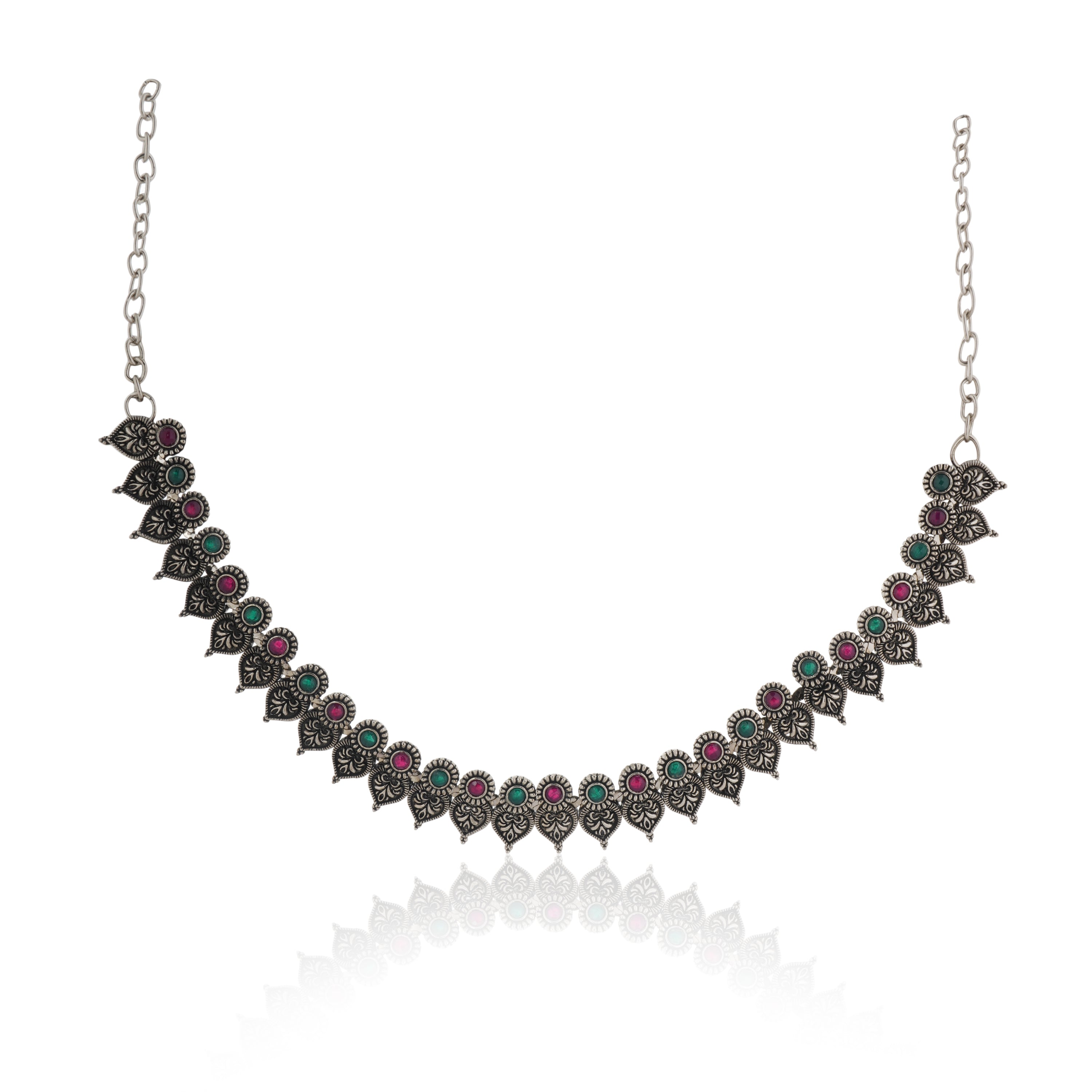 Elegant oxidized necklace set with green and pink stones, paired with matching jhumka earrings.