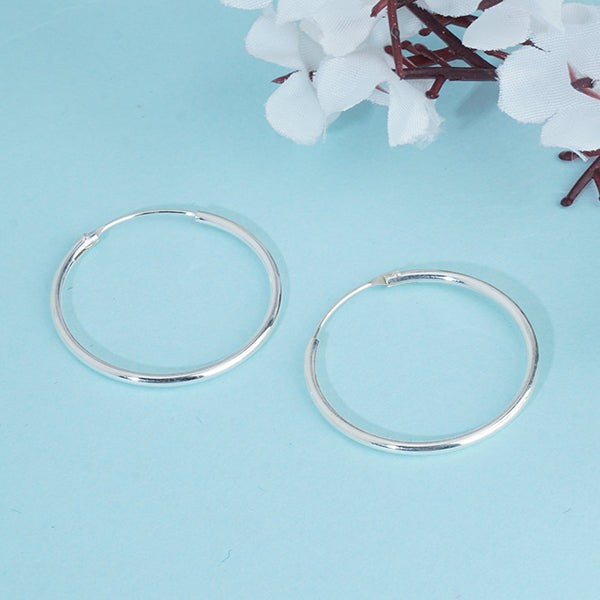 Sleek 925 silver hoop earrings with a stylish ring design, adding modern elegance to any outfit.