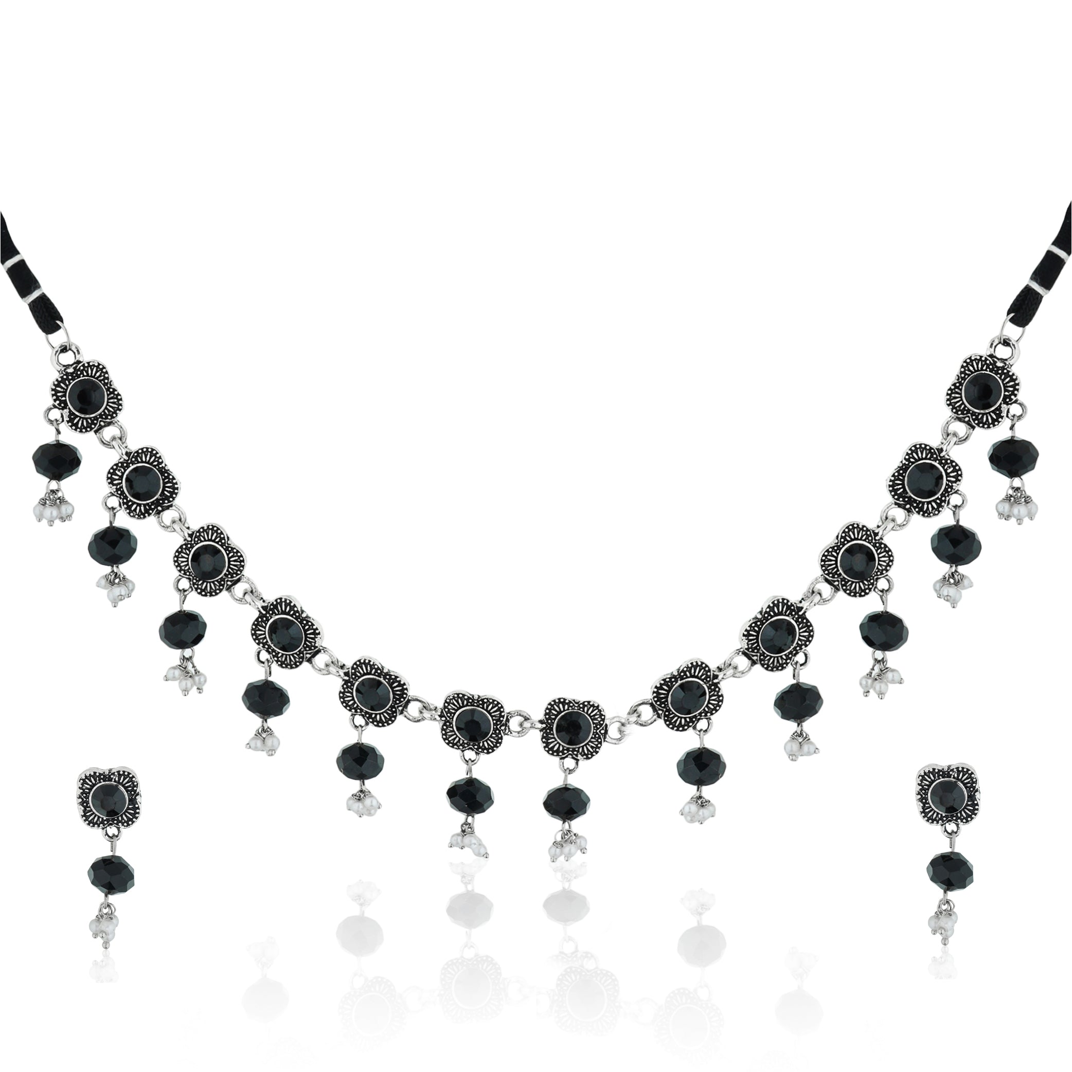 Elegant oxidized short necklace set with black stones, offering a bold and sophisticated look.