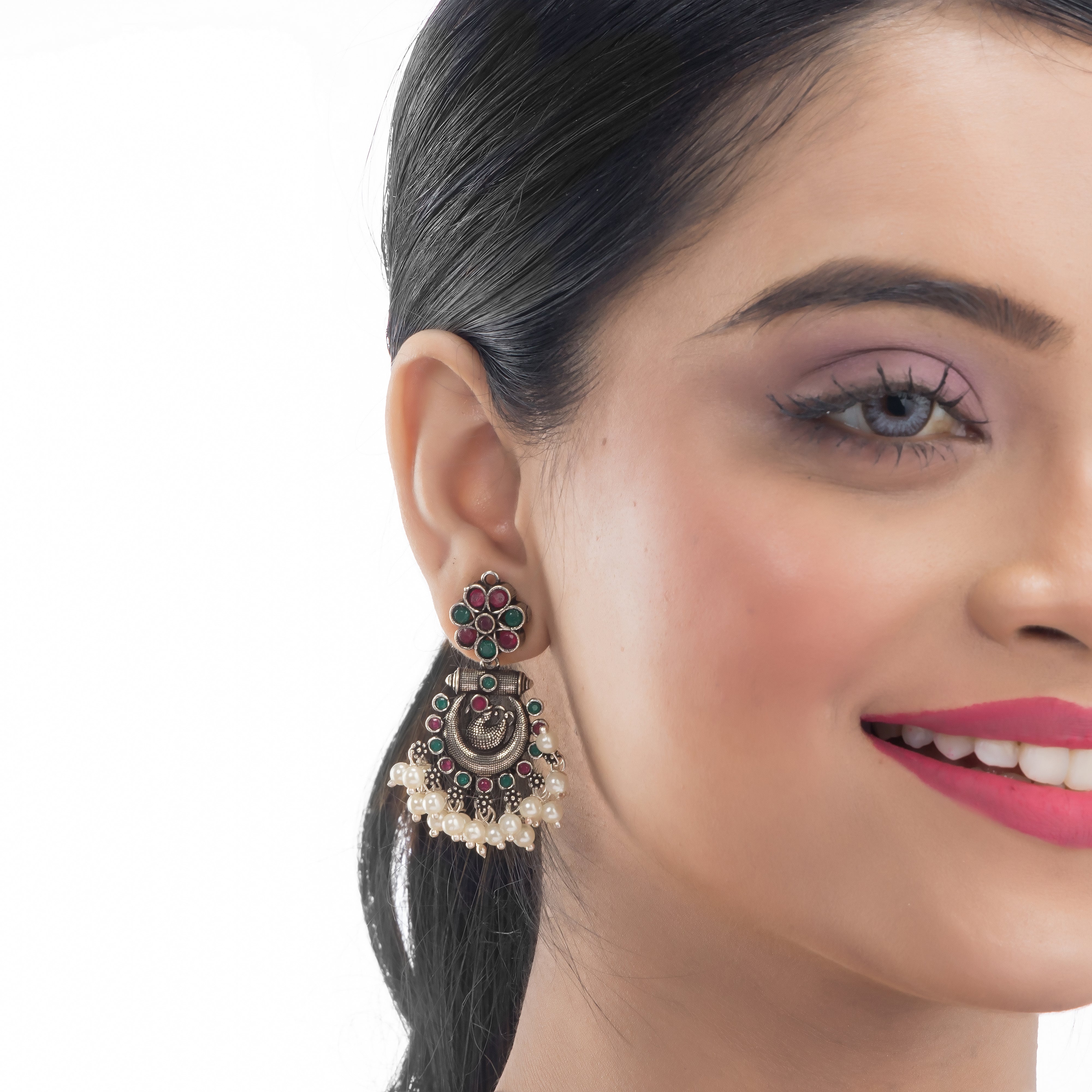 Intricate oxidized necklace set with a beautiful peacock design for a festive look.