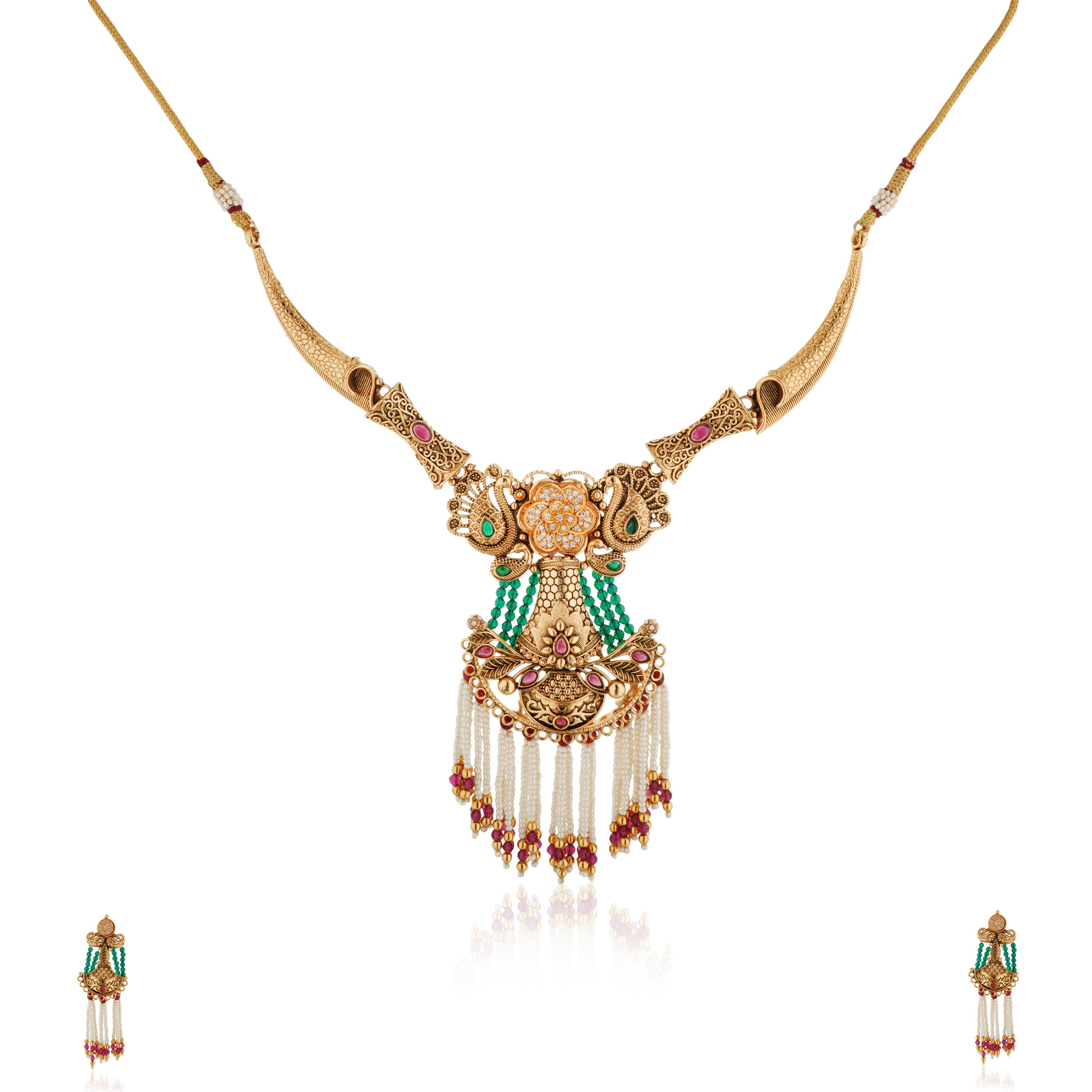 Graceful gold-tone long necklace adorned with pearls, blending tradition with sophistication.