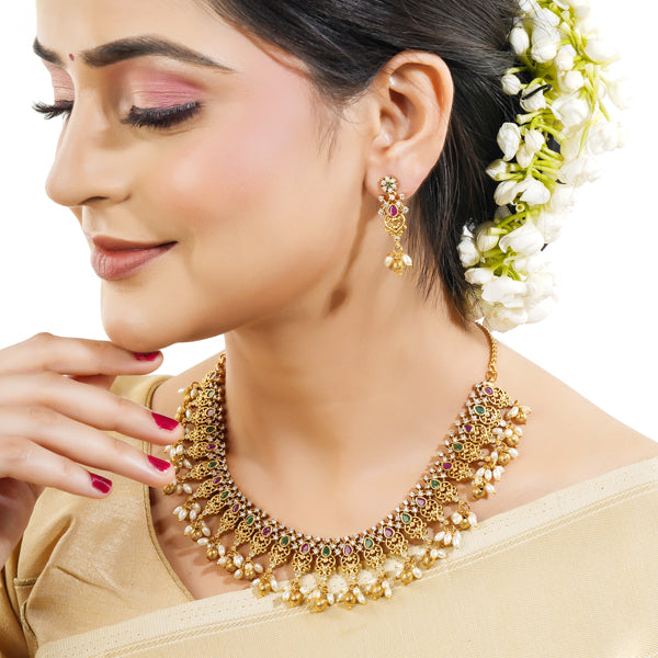 "Gold-tone short necklace set with multicolor stones and zircon accents for a festive look."