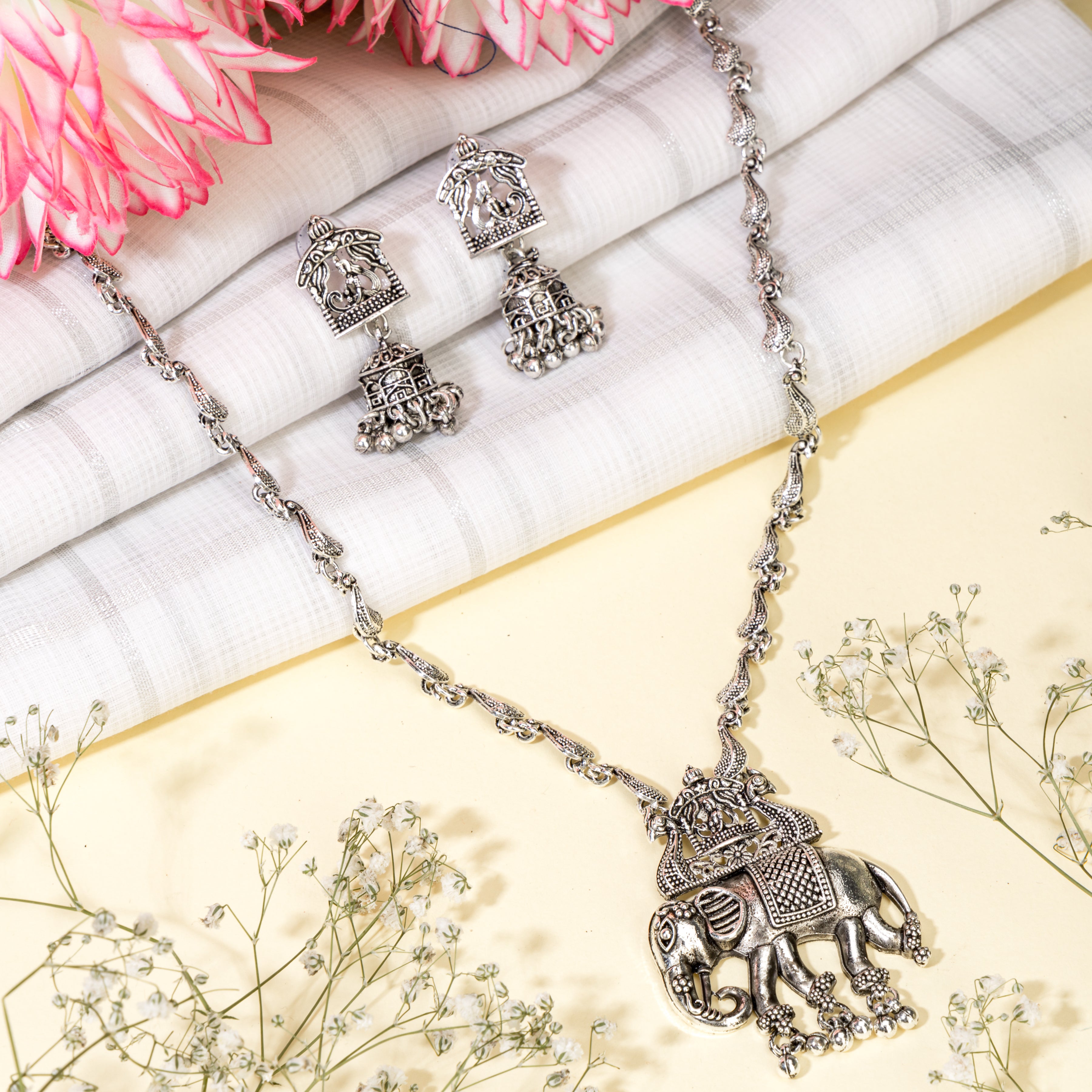 "Intricately crafted oxidized long necklace set with a detailed elephant design, perfect for festivals."