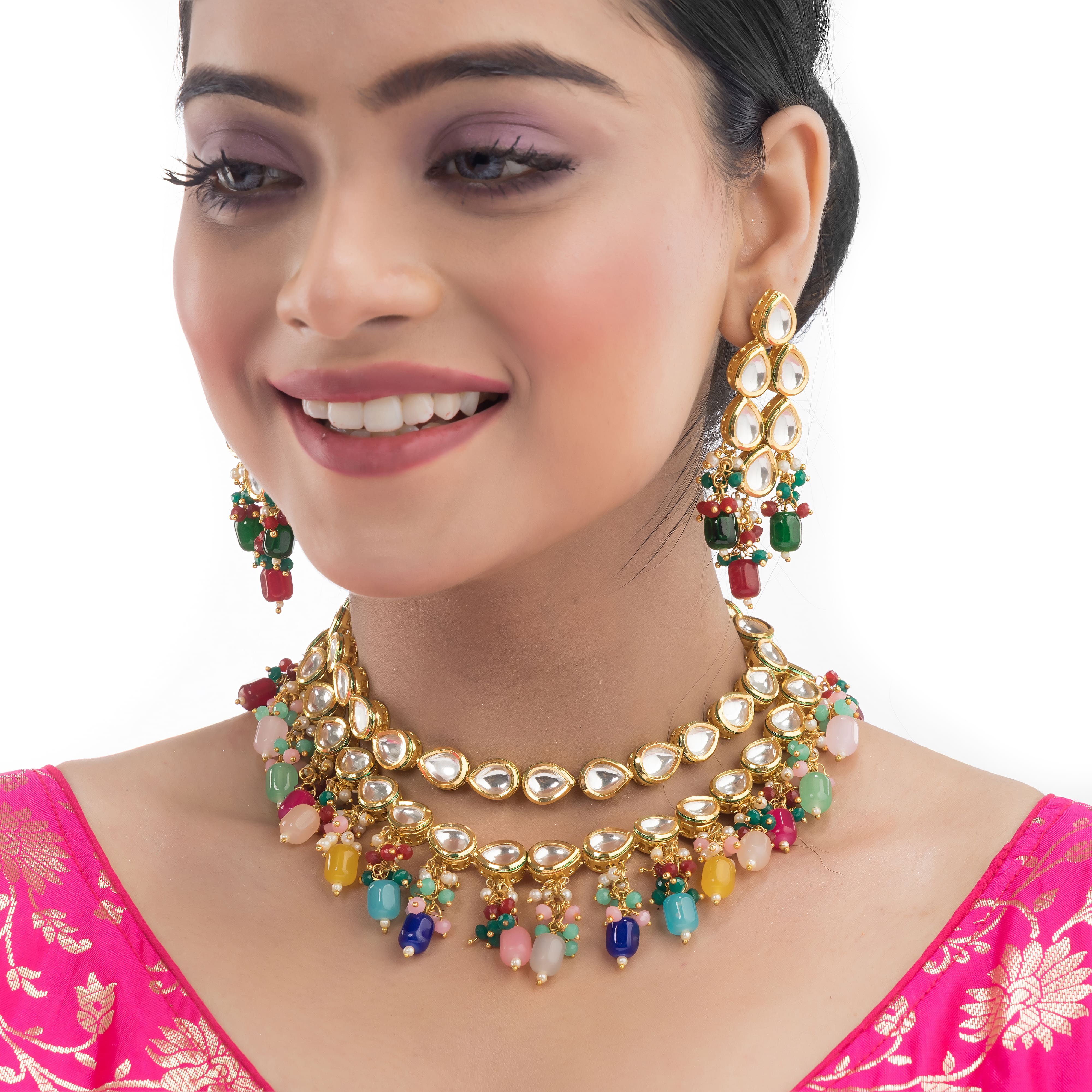 "Elegant double-layer Kundan necklace set with multicolor pearls, perfect for a vibrant festive look."