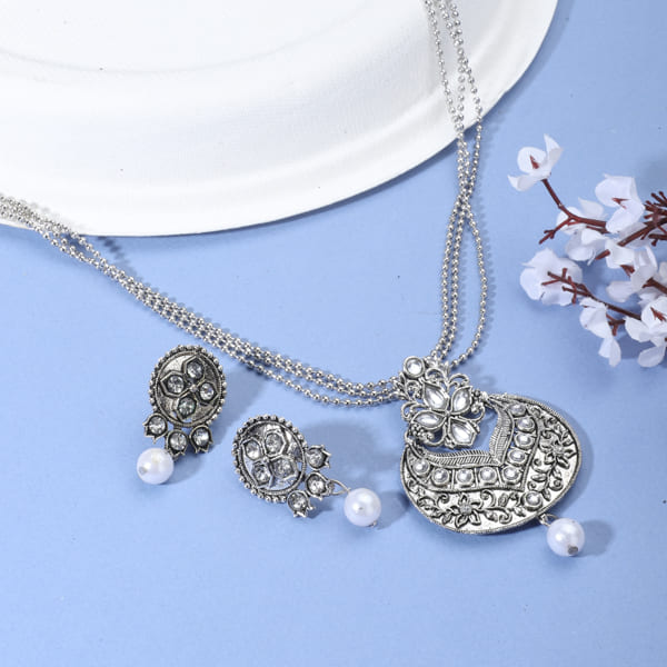 "Charming oxidized silver short necklace set with vintage detailing for any festive outfit."