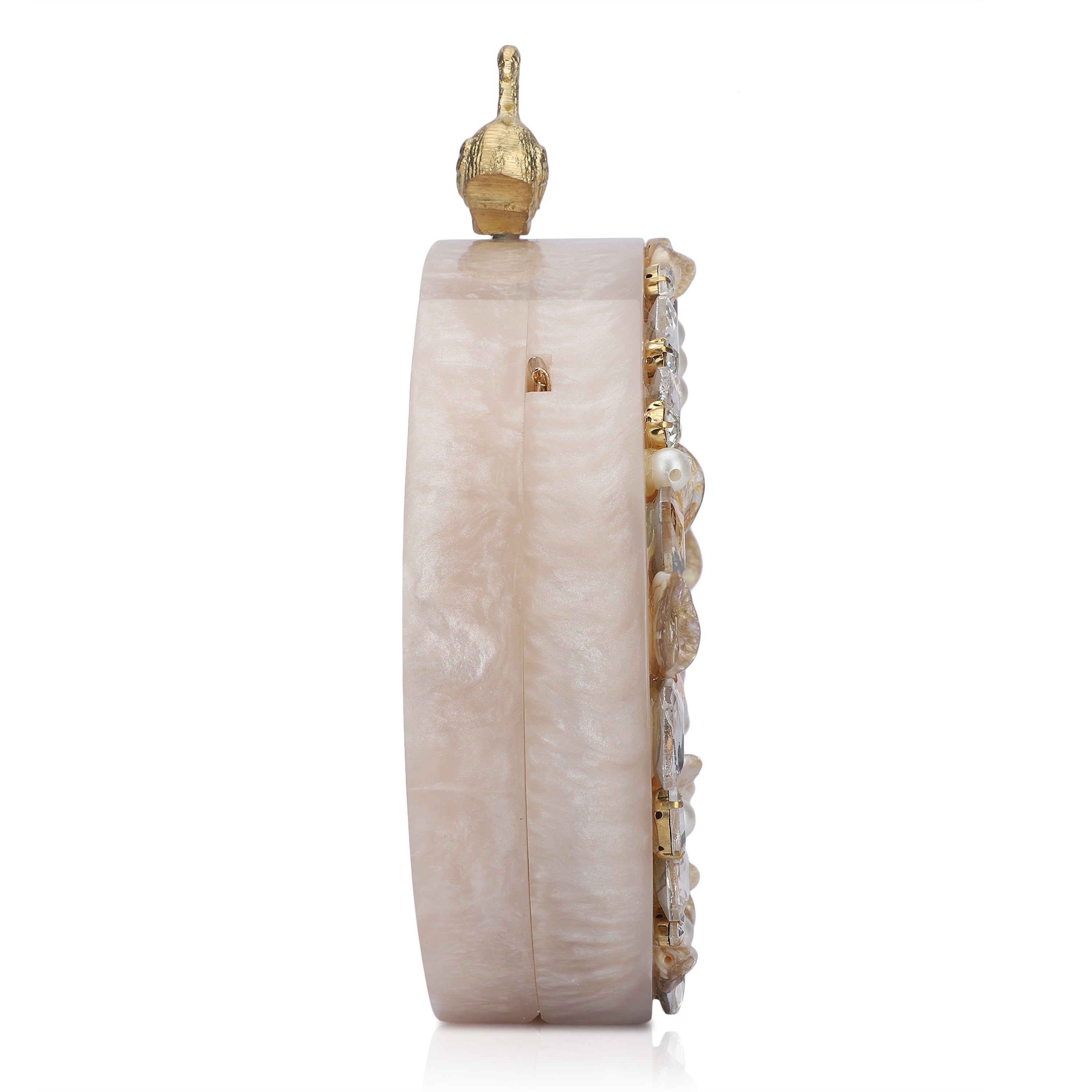 Oval-shaped salmon resin clutch with peacock design closure and sleek sling chain for style.