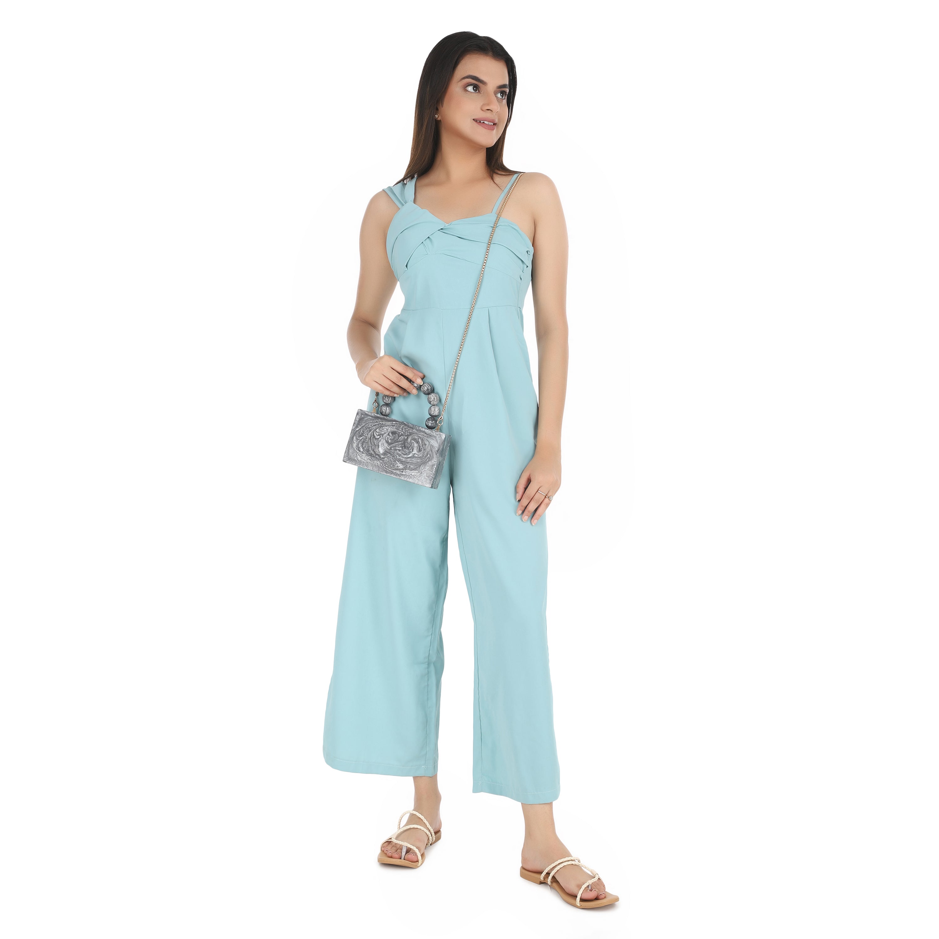 Grey resin clutch with velvet lining, heavy-duty sling, and extra pocket for convenient storage.