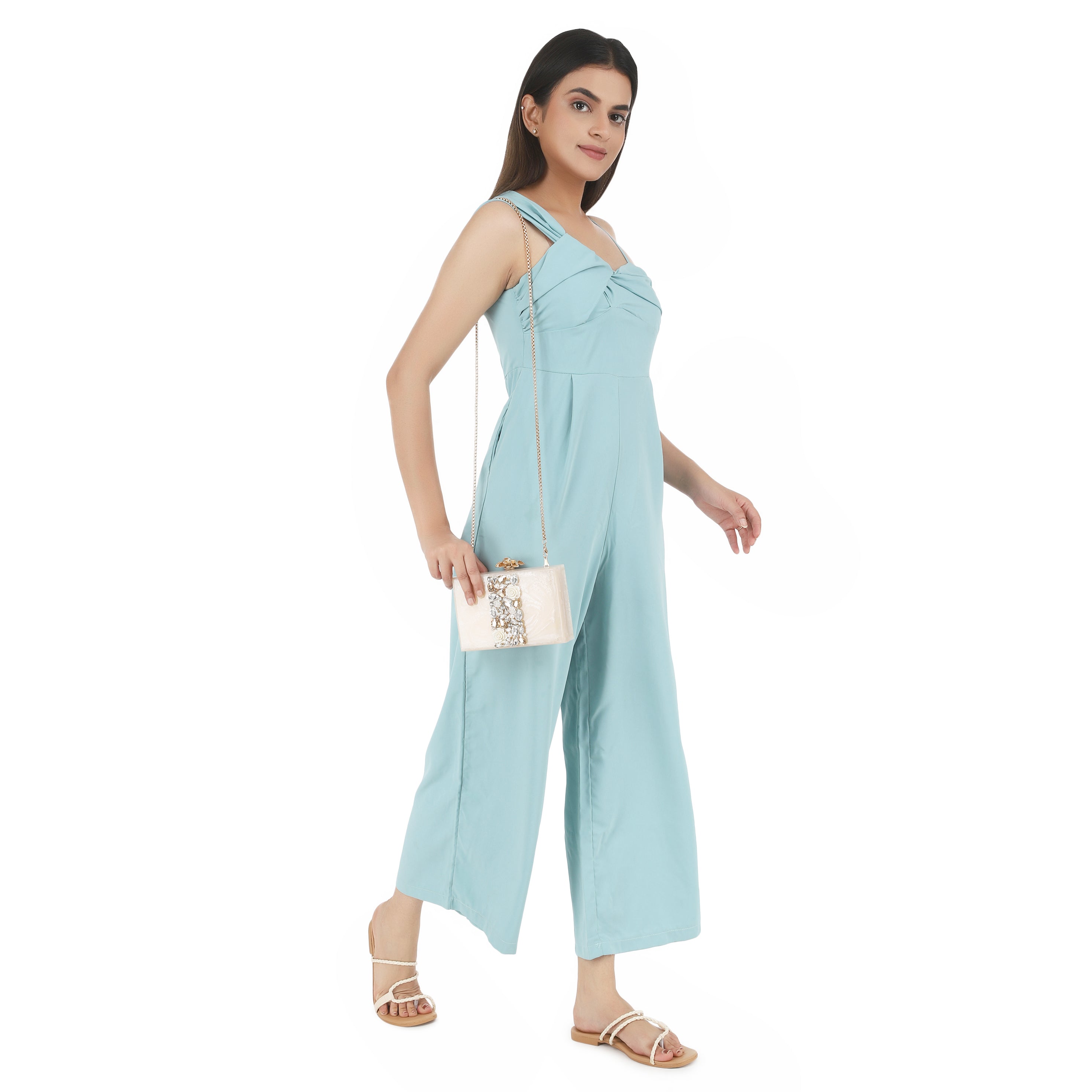 Embellished salmon resin clutch with extra pocket and sturdy sling for a chic and convenient style.