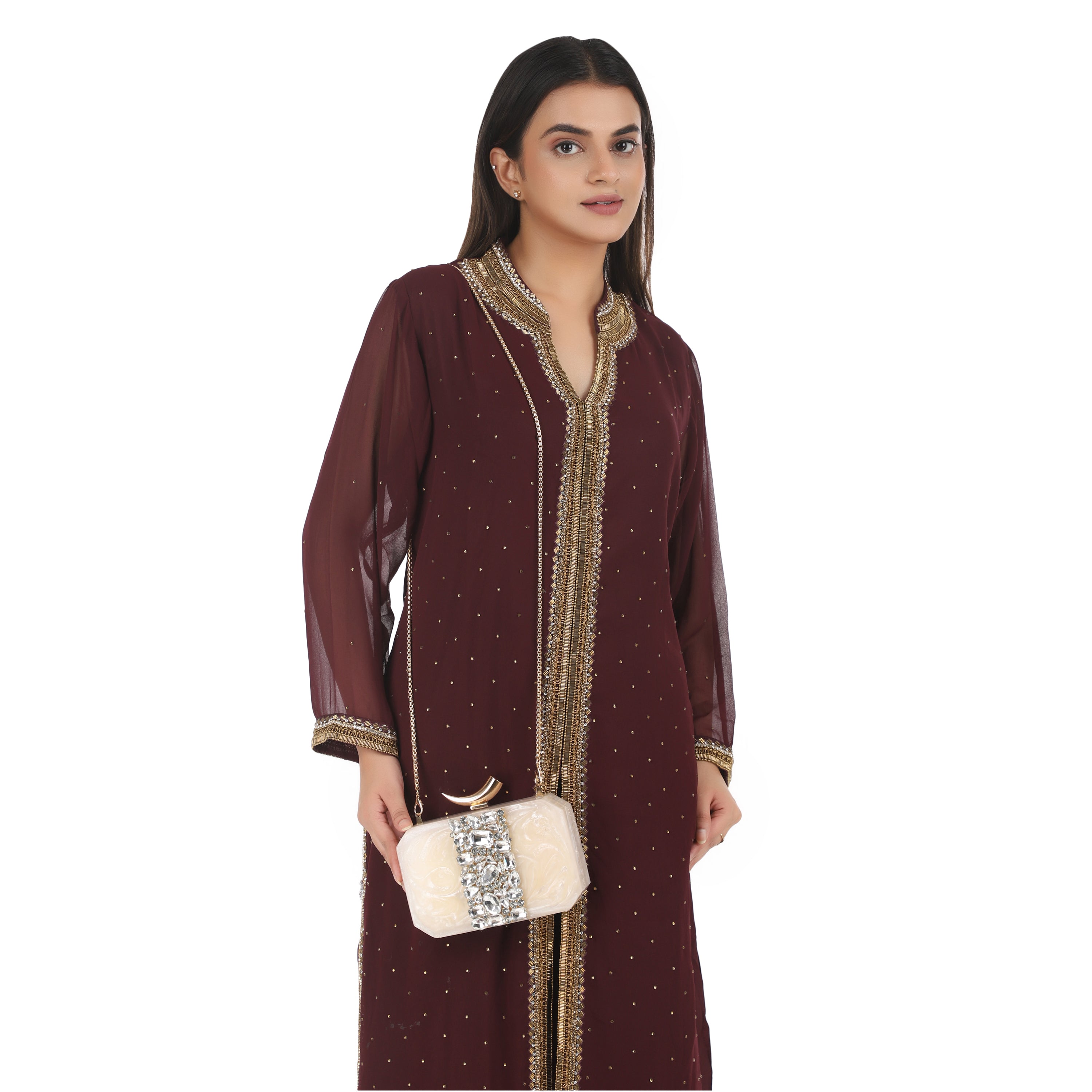 Salmon resin clutch with stone embellishments, soft lining, and extra pocket for practical storage.