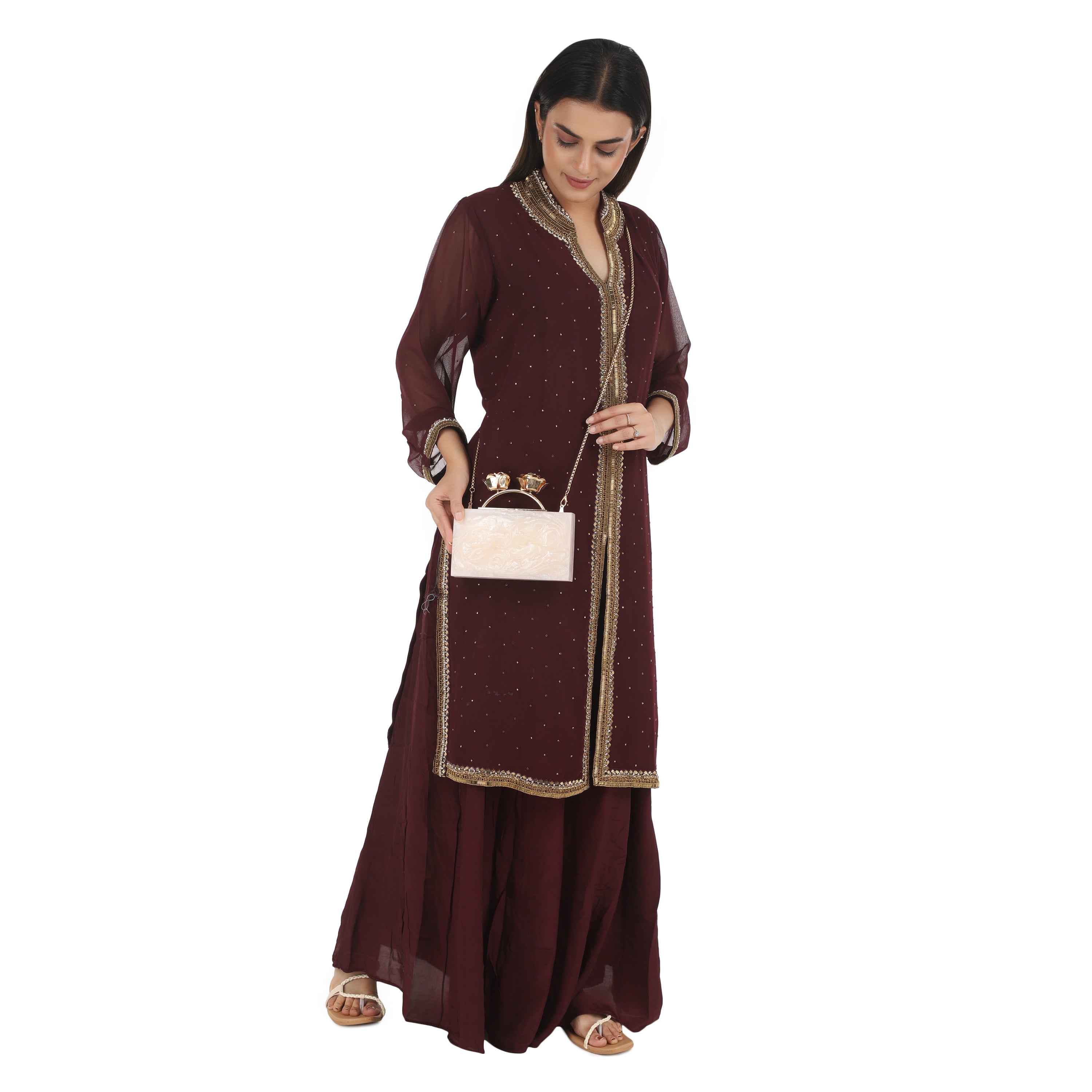 Elegant salmon resin clutch with rose knob, soft lining, and heavy sling for convenience.