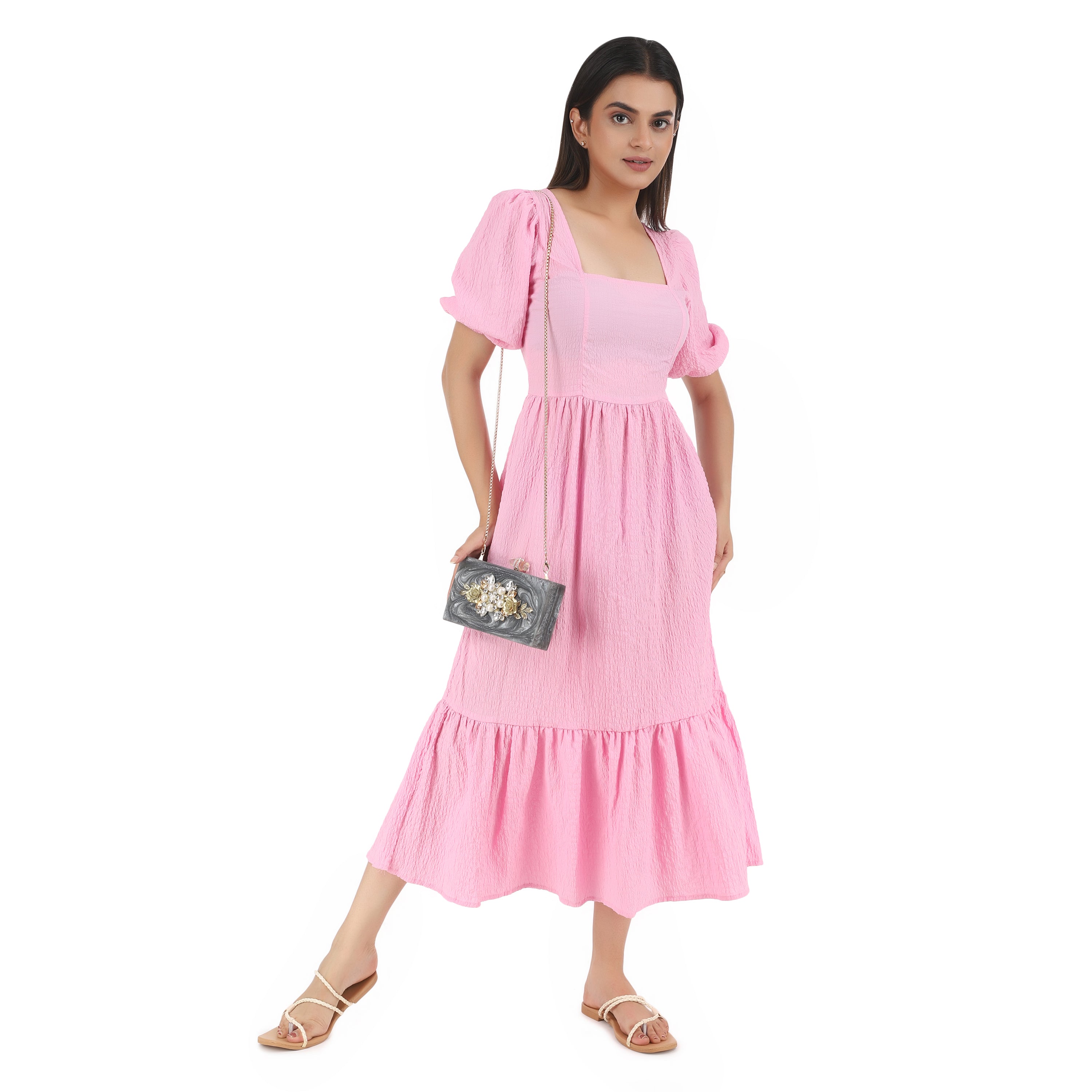 Exclusive grey resin clutch with heavy sling, soft elastic lining, and extra pocket for convenience.