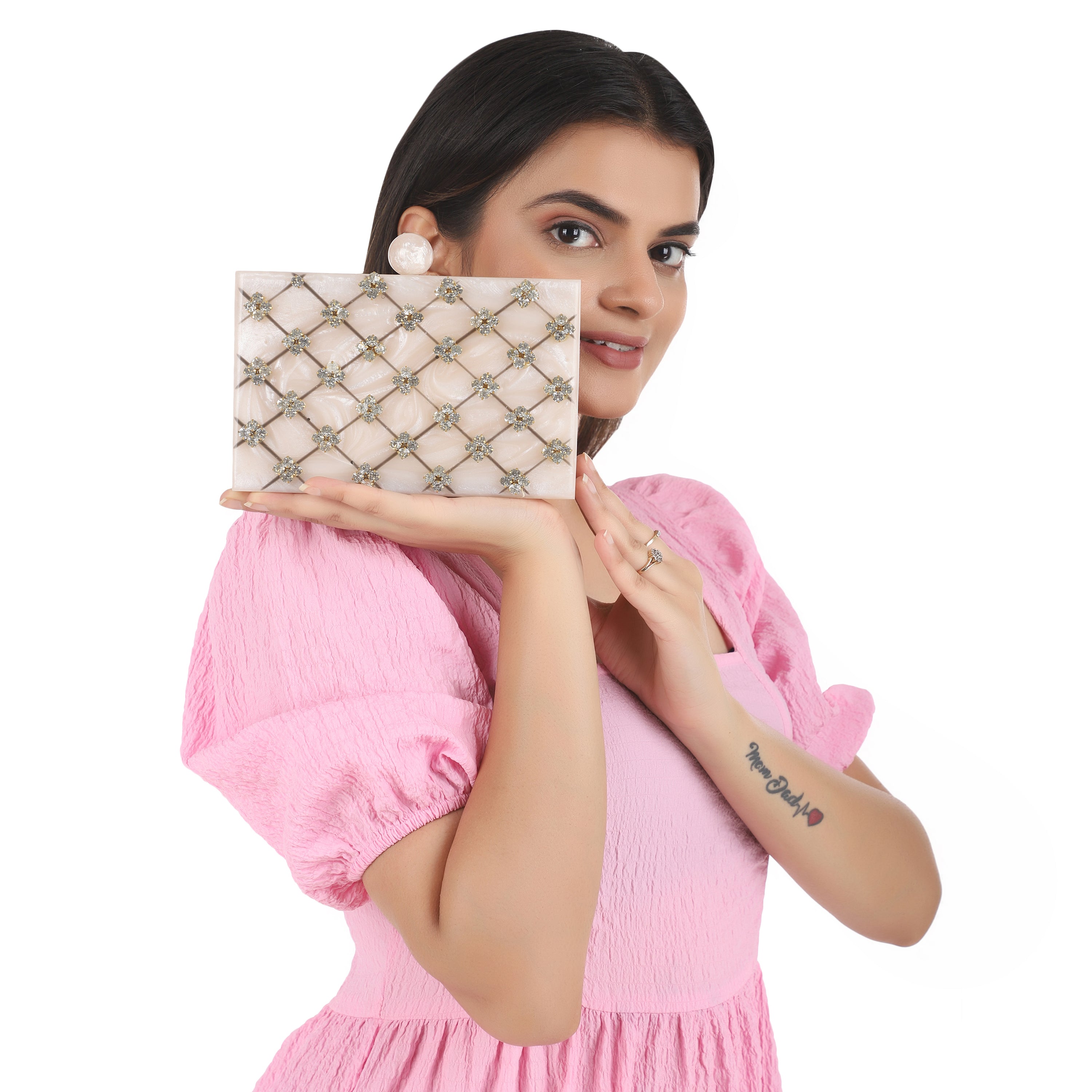 Beautifully crafted salmon resin clutch with exquisite details, perfect for showcasing your style.