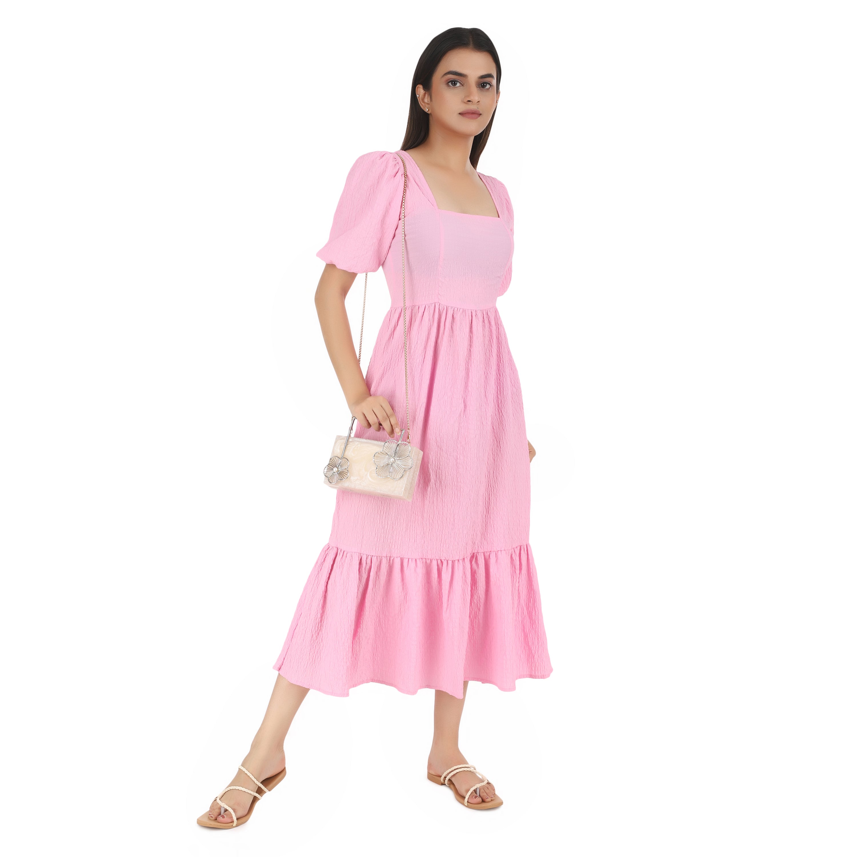 Salmon resin clutch with unique flower handles, heavy sling, and extra pocket for convenience.