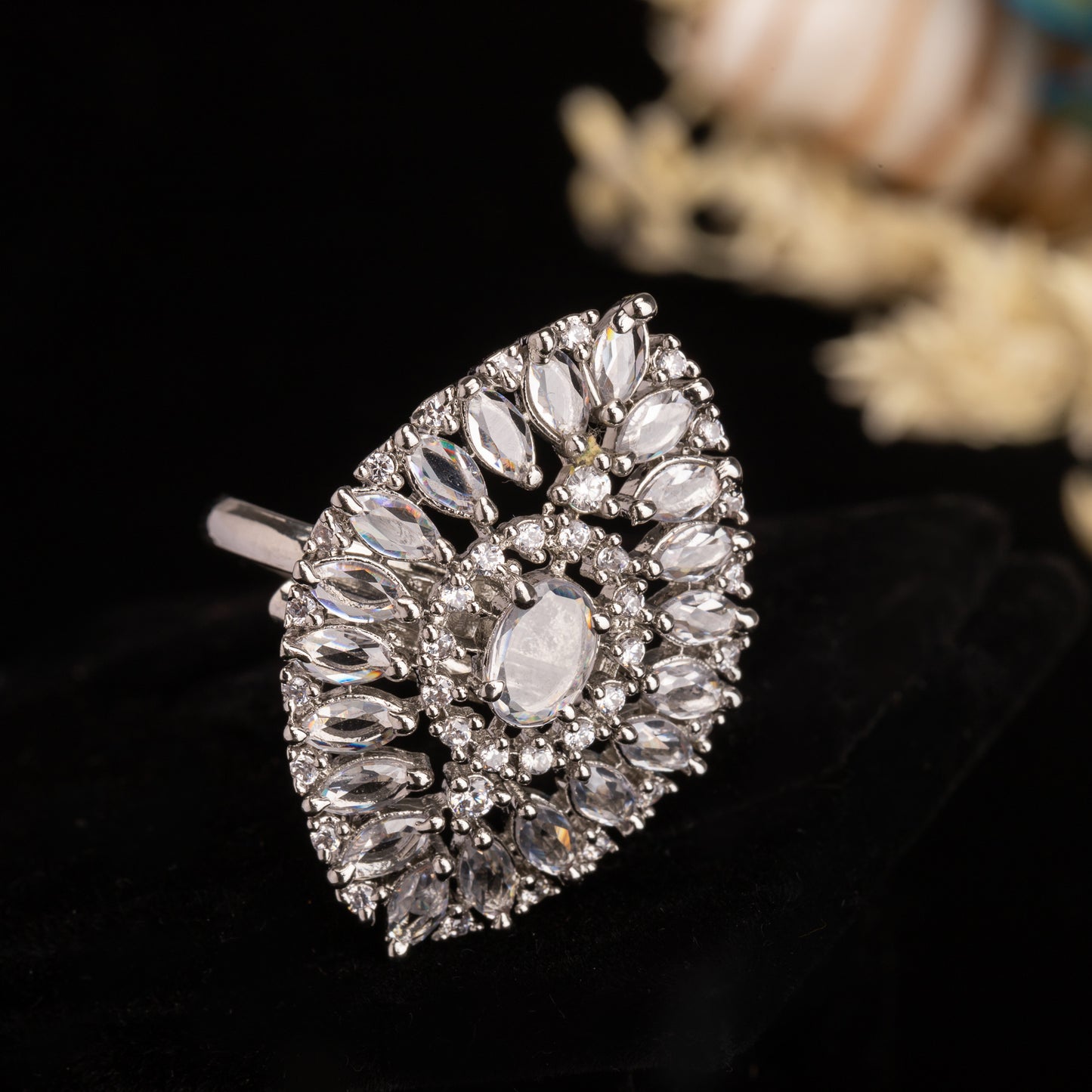 A SILVER ZIRCON FINGER RING OFFERS A SLEEK, MODERN LOOK WITH SPARKLING ELEGANCE.