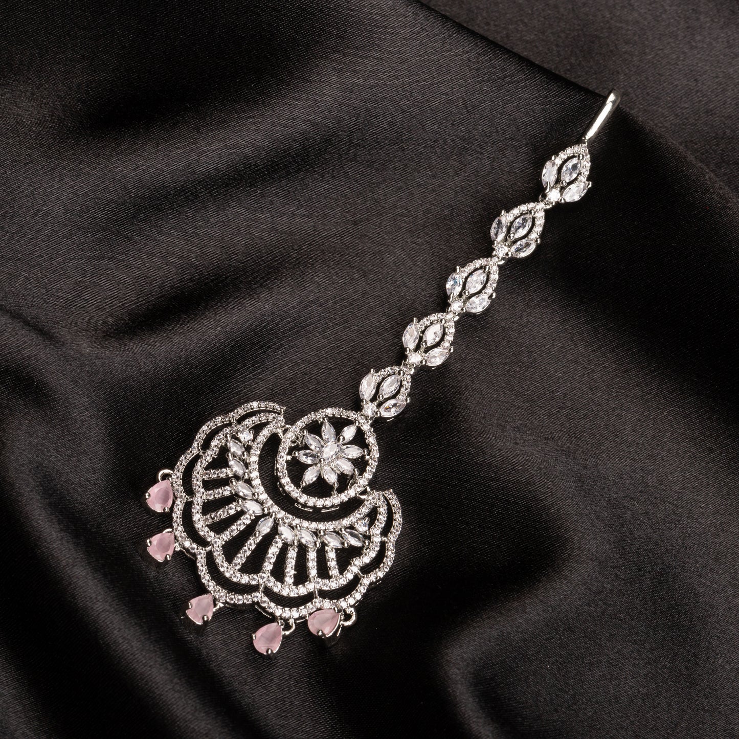 A SHORT PINK  ZIRCON MAANGTIKA OFFERS A SUBTLE YET STRIKING TOUCH OF COLOR AND ELEGANCE.