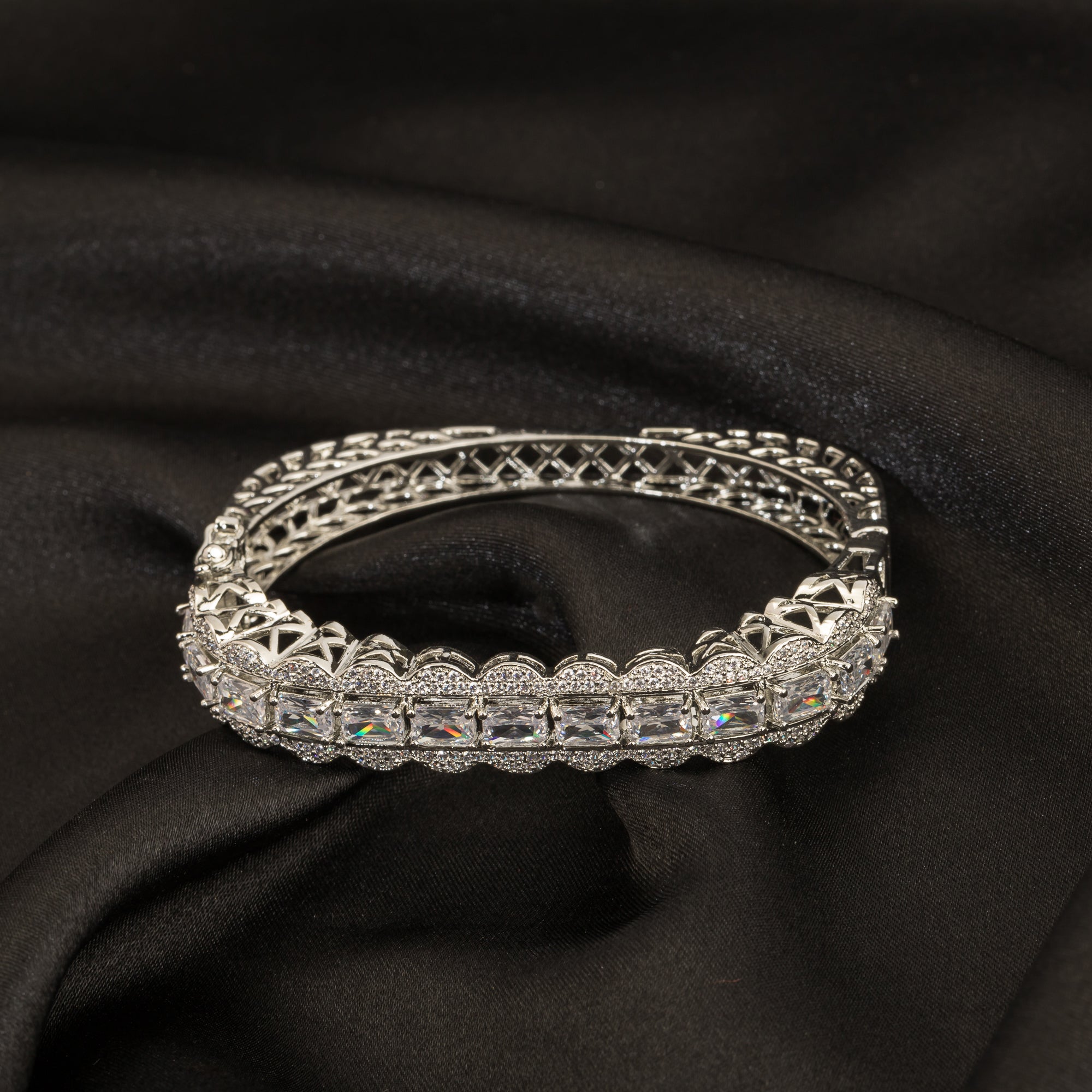 Stunning zircon bracelet with studded stones, perfect for party wear, adding elegance and shine."
