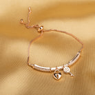 "Trendy lock and key zircon bracelet in rosegold, ideal for party wear, offering a chic and stylish look."
