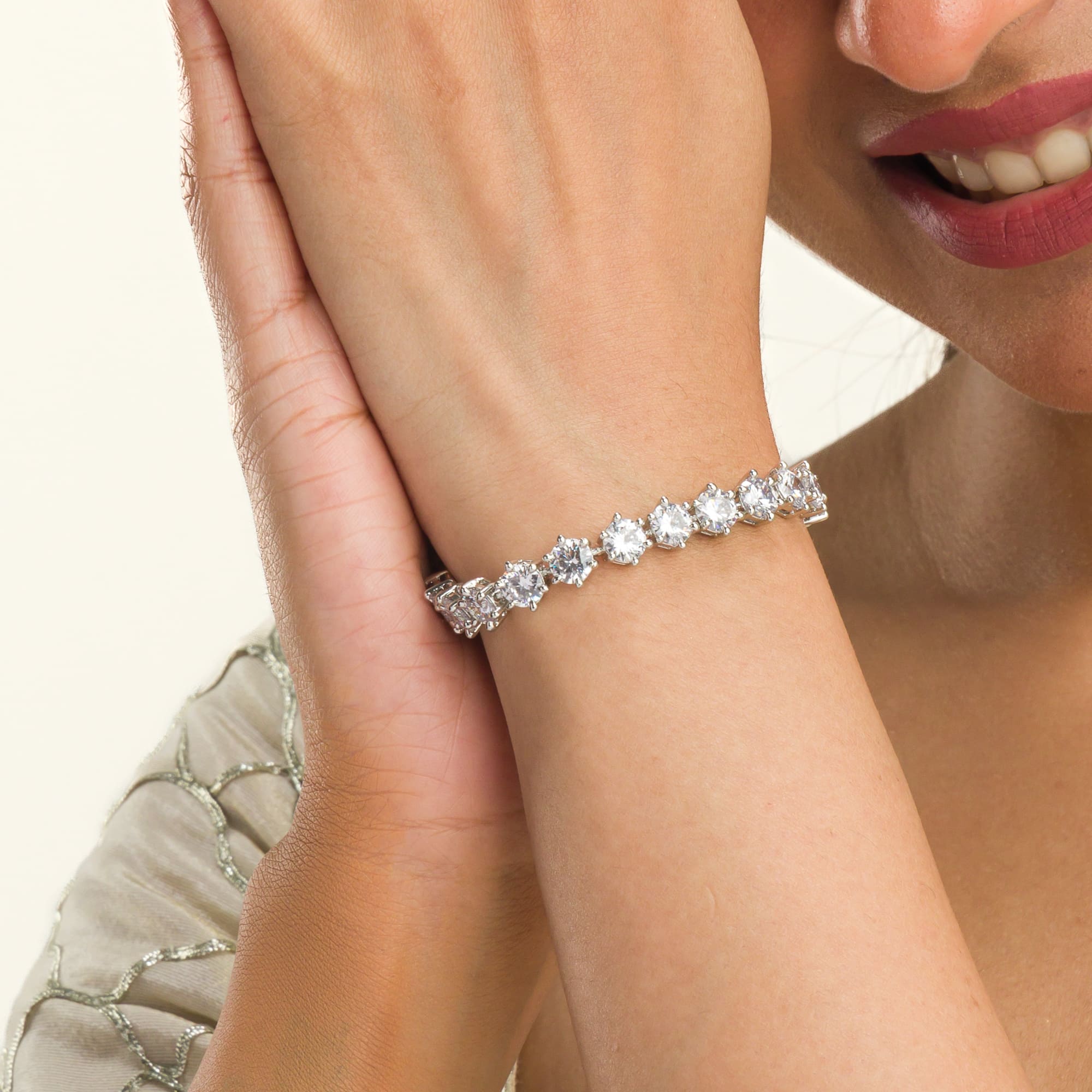 Stunning zircon stone chain bracelet in silver, perfect for party wear, adding sparkle and elegance."
