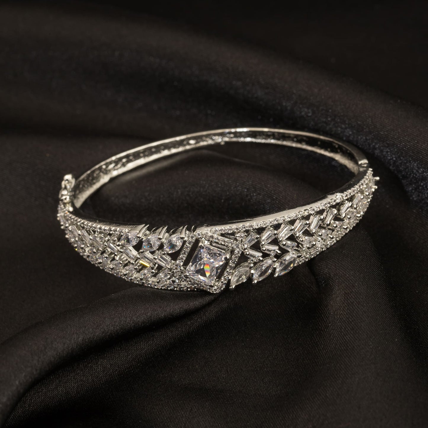 A ZIRCON BRACELET ADDS A TOUCH OF DAZZLING BRILLIANCE TO ANY WRIST WITH ITS STUNNING SPARKLE.