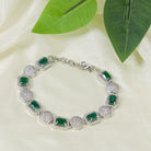 Elegant zircon bracelet with green stones, combining delicate sparkle with vibrant color for party wear."
