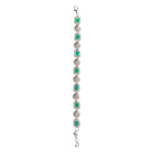 Elegant zircon bracelet with green stones, combining delicate sparkle with vibrant color for party wear."
