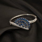 "Blue zircon bracelet in silver, radiating with captivating azure brilliance, perfect for party wear."
