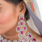 Elegant Pink Zircon Kiara bridal set, featuring delicate pink stones for a refined bridal look, perfect for party wear."
