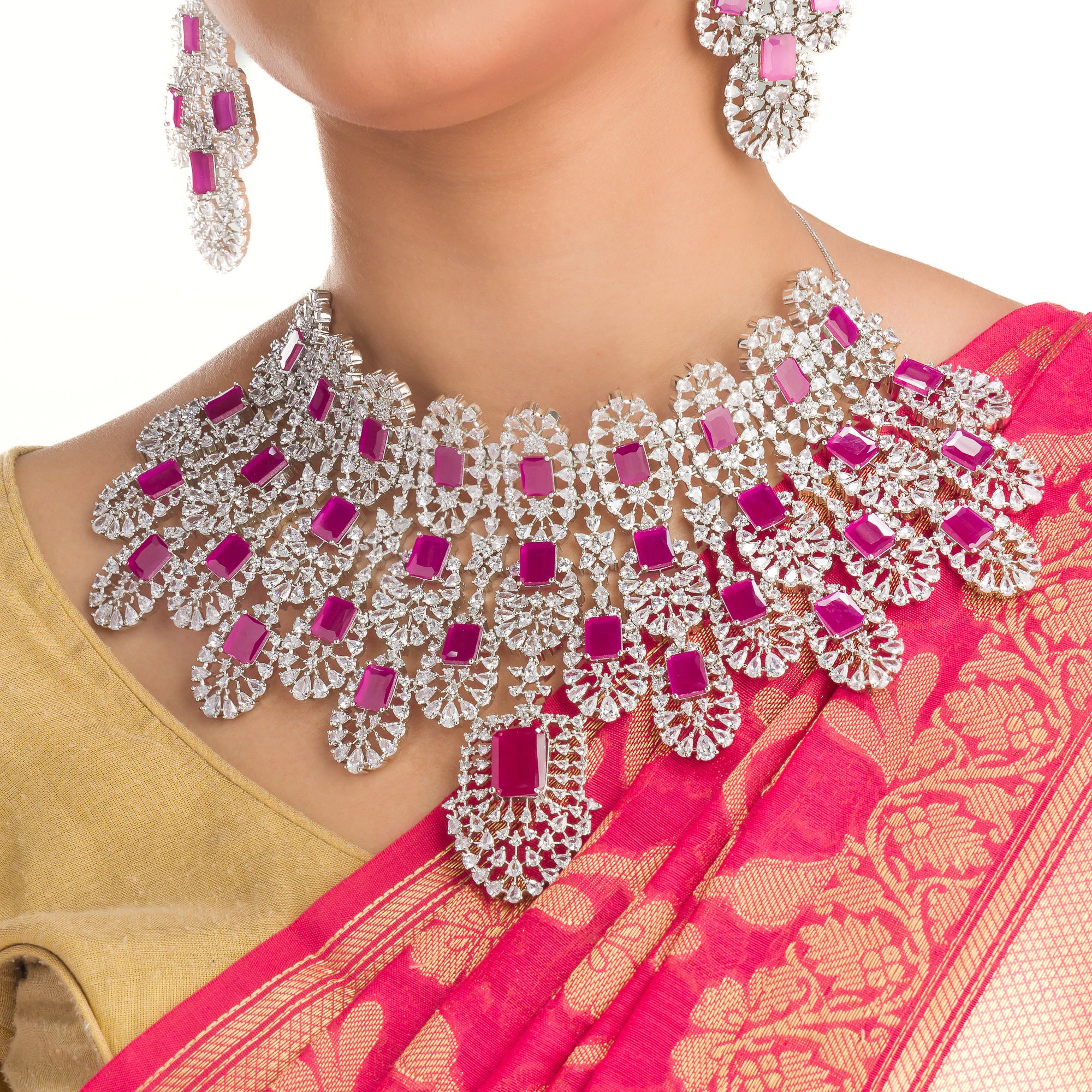 Elegant Pink Zircon Kiara bridal set, featuring delicate pink stones for a refined bridal look, perfect for party wear."
