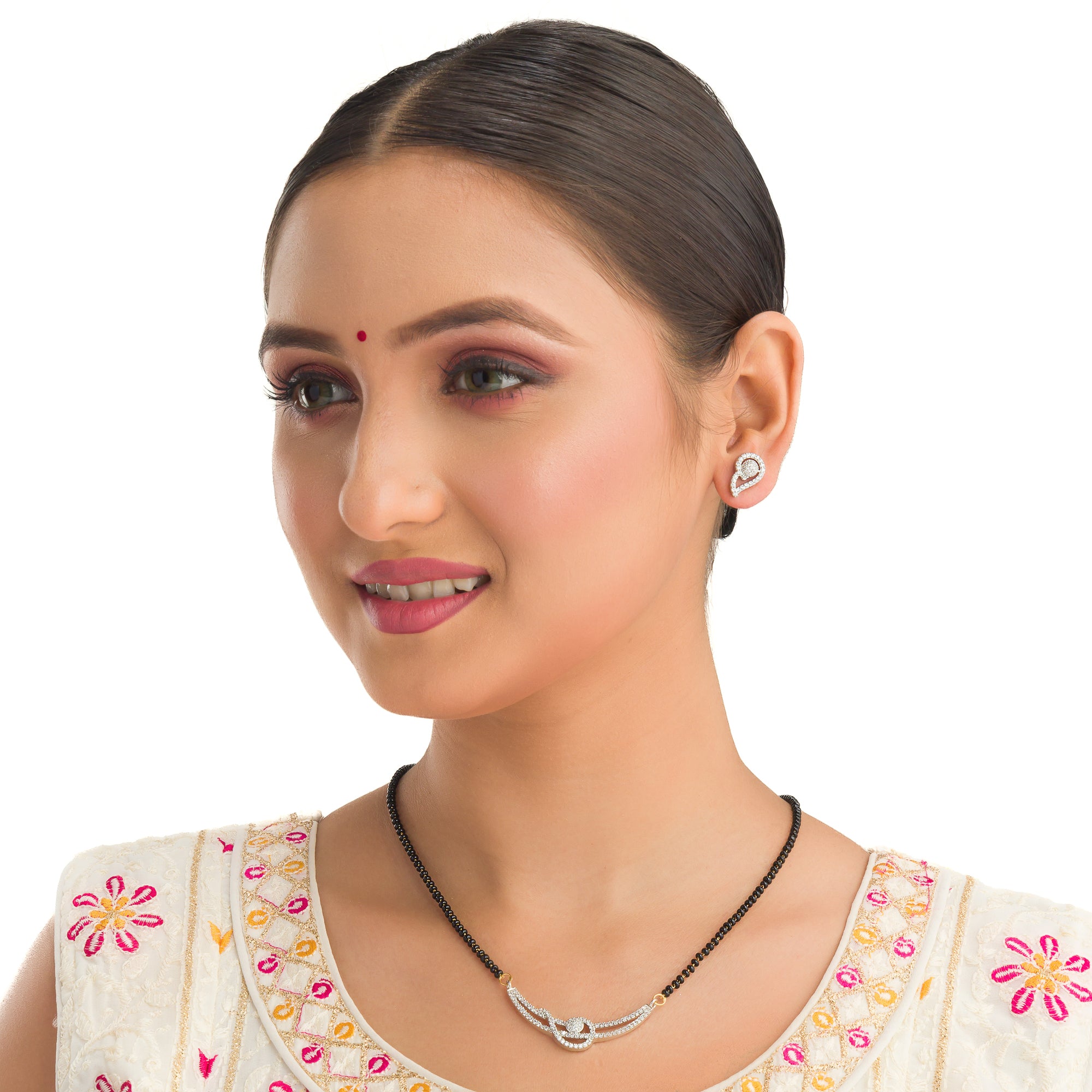 "Black zircon mangalsutra in gold, blending traditional charm with radiant, modern sparkle."
